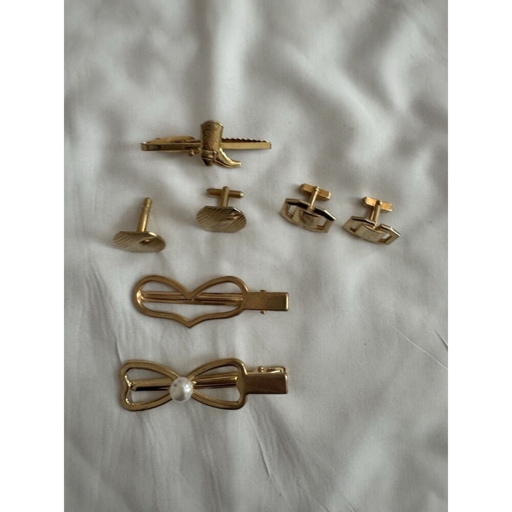 Set of Gold Tone Vintage Cufflinks And Tie Clips.